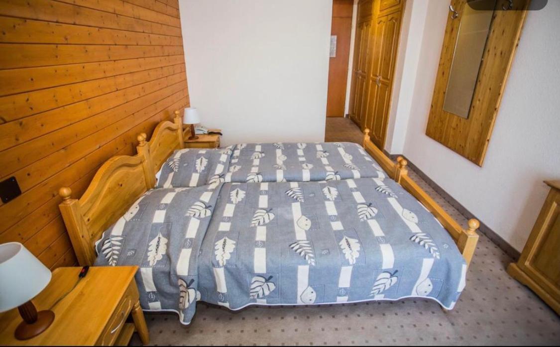Chambre Double (1 Adulte + 2 Enfants)