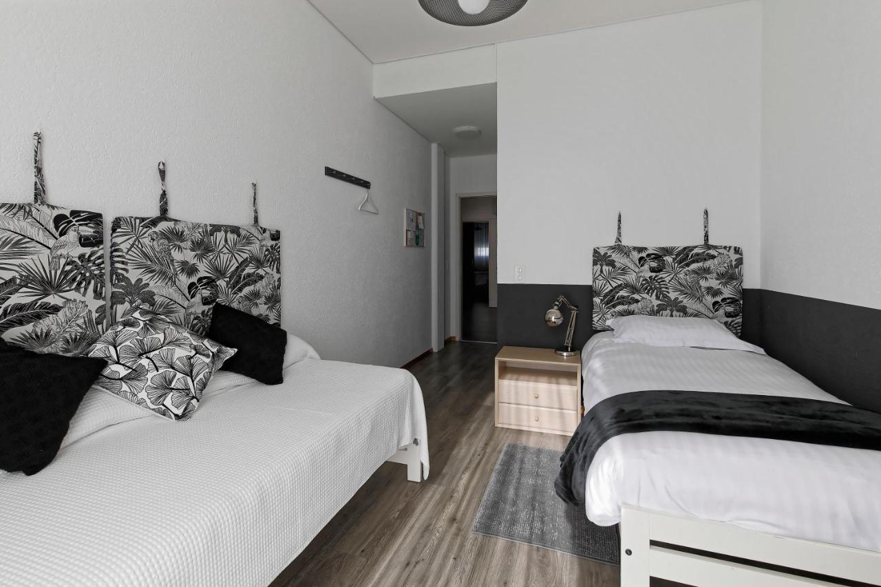 Quarto com 2 Camas de Solteiro