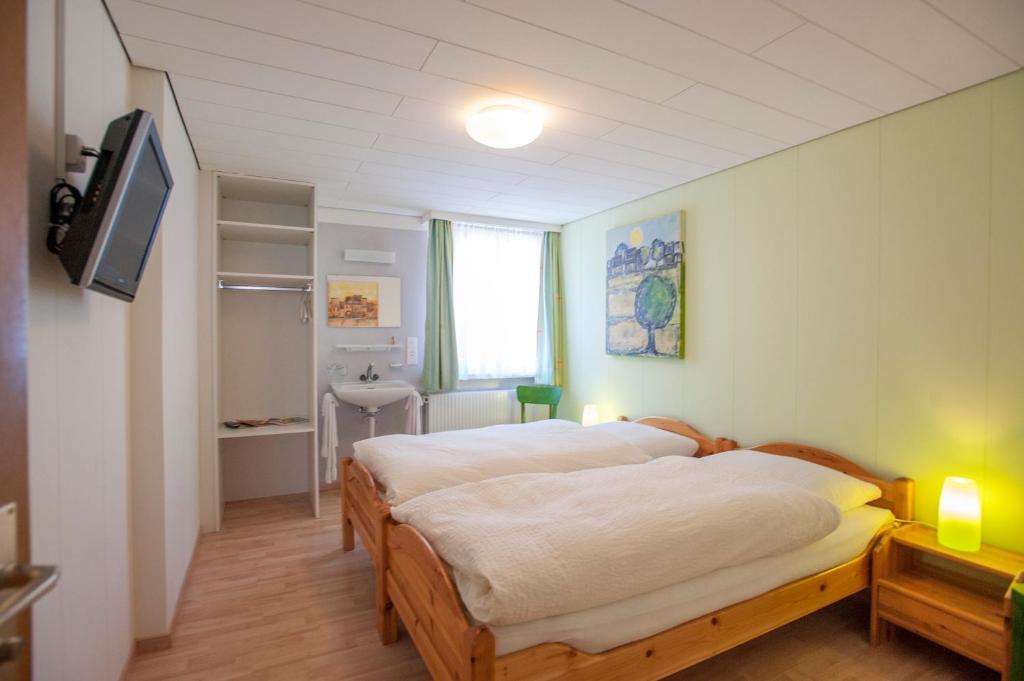 Tweepersoonskamer met Gedeelde Badkamer