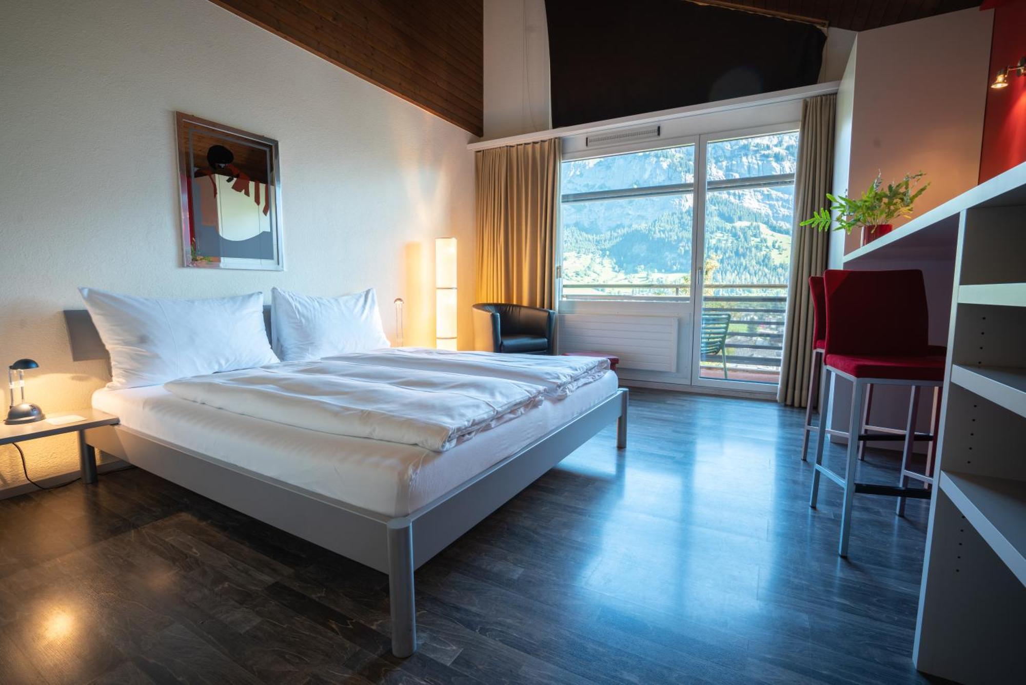 Comfort Doppelzimmer mit Balkon und Zugang zu Innenpool und Sauna