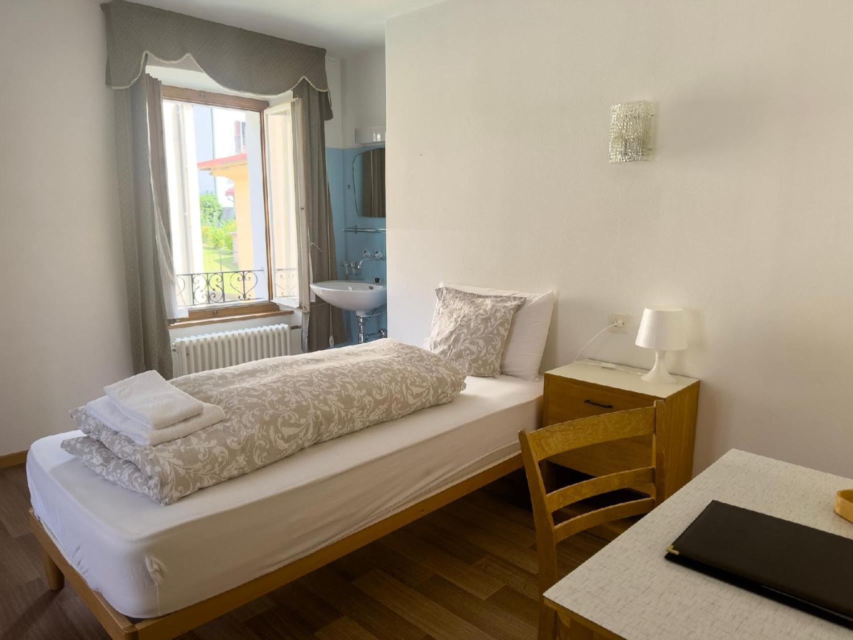 Camera Singola con Bagno in Comune