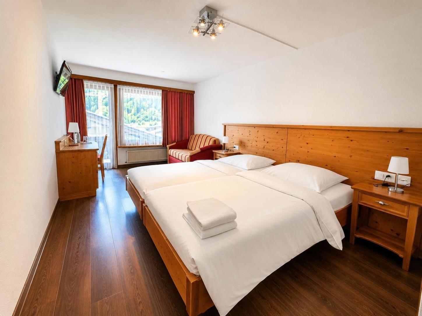 Doppel- oder Zweibettzimmer