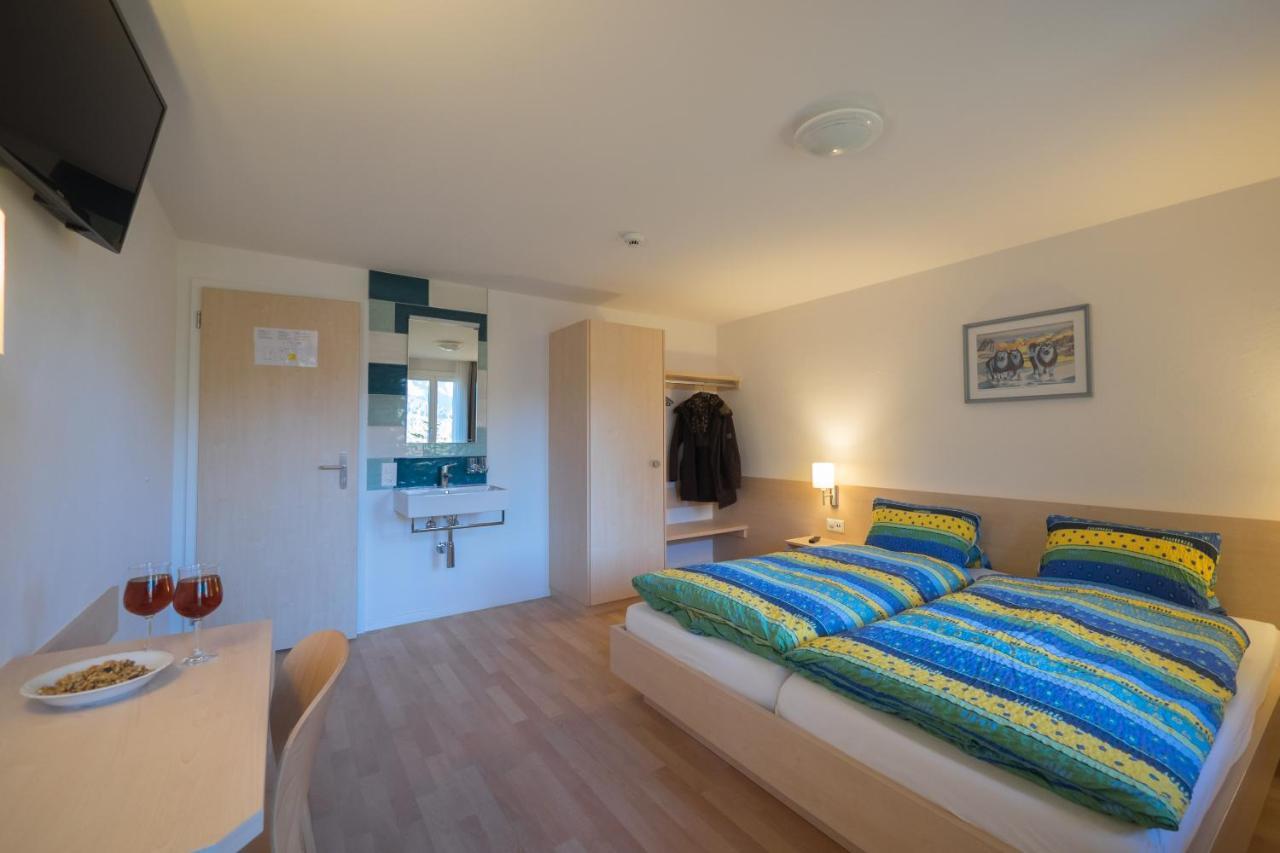 Family Room (2 Adults + 2 Children) with Balcony and Mountain View