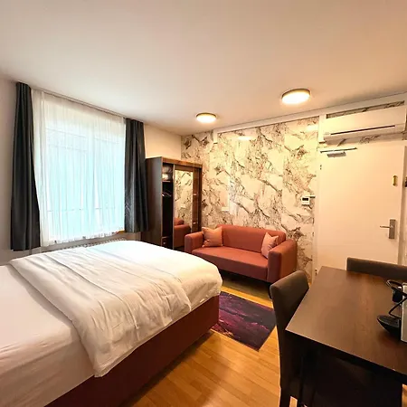 Akomo Bern-3