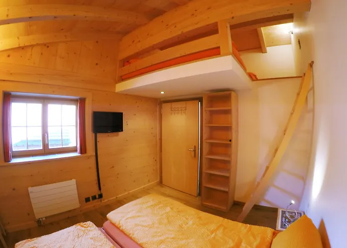 Alpenchalet Weidhaus Gstaad - Dachwohnung - Studio - Stockbettzimmer